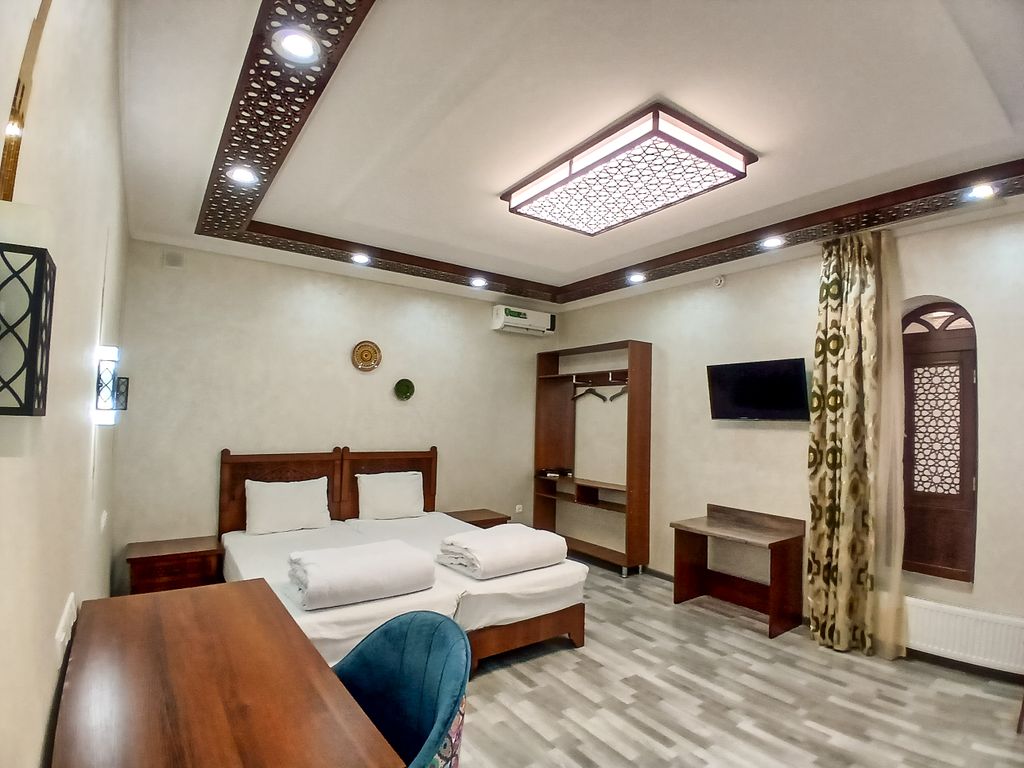 Отель Отель AYUB Modern & Heritage — Бухара