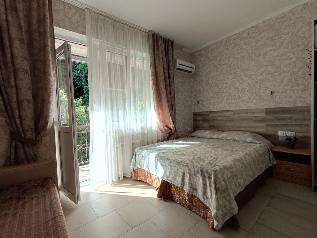 Двухместный номер с 2 отдельными кроватями стандарт с балконом