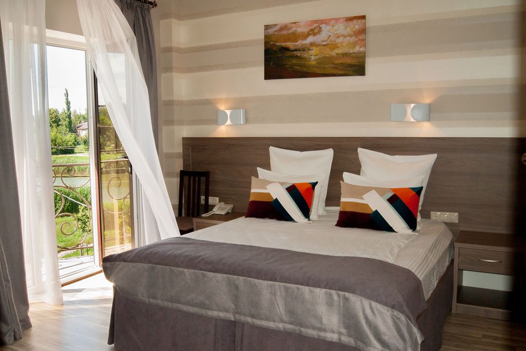 Двухместный номер с 1 кроватью улучшенный с видом на город