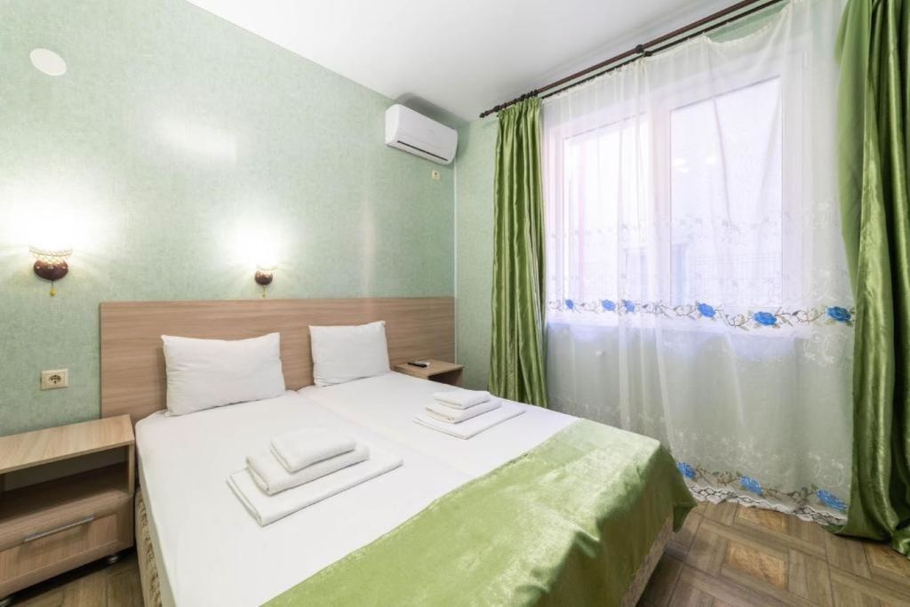 Двухместный номер с 1 кроватью или двумя раздельными и дополнительным спальным местом