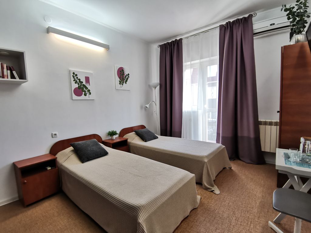 Двухместный номер с 2 отдельными кроватями стандарт