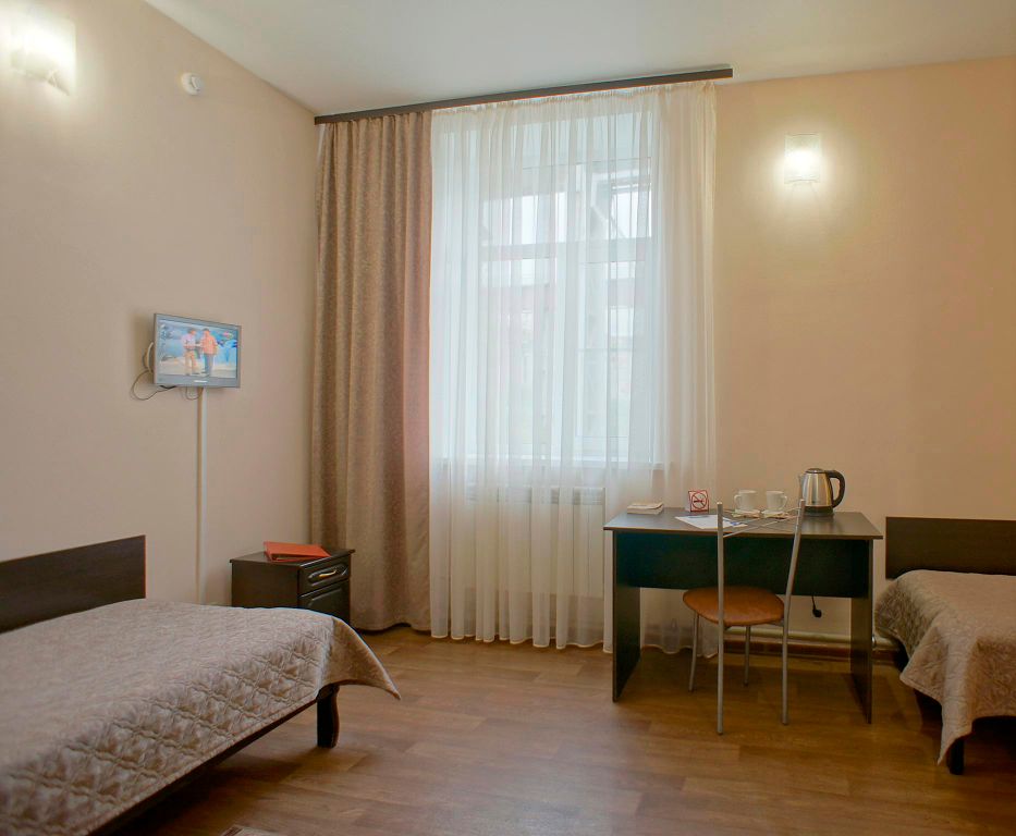 Двухместный номер с 2 отдельными кроватями стандарт