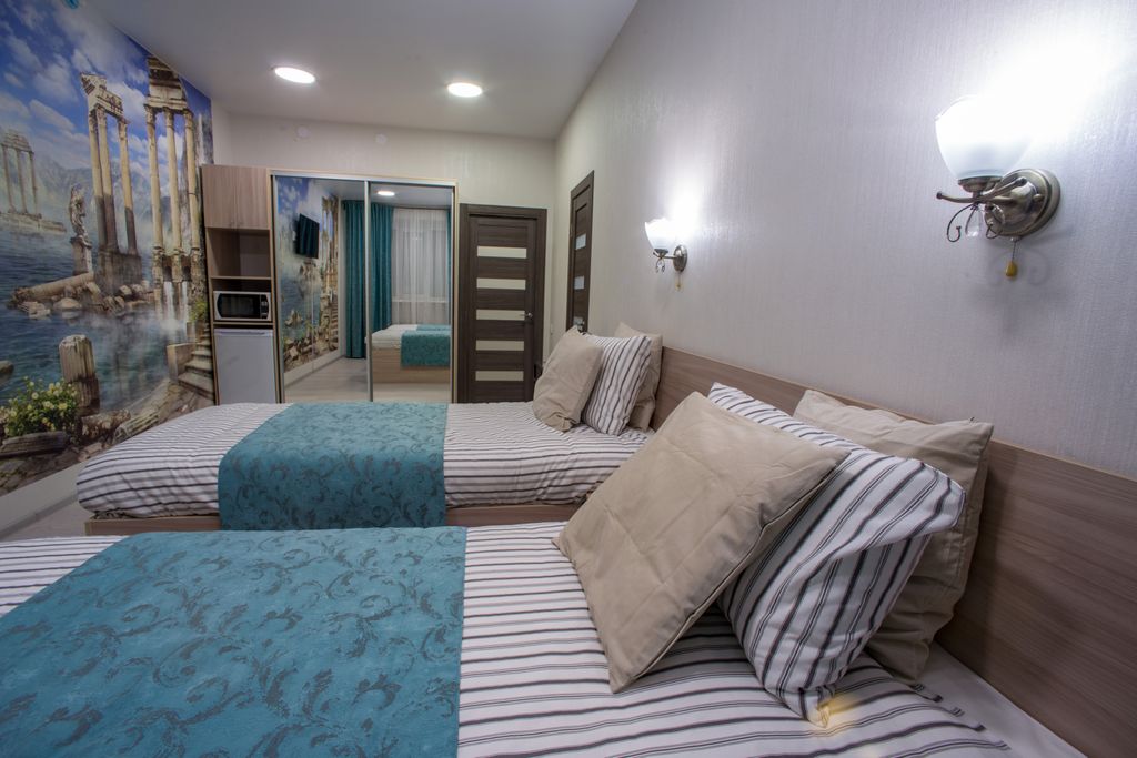 Двухместный номер с 2 отдельными кроватями улучшенный