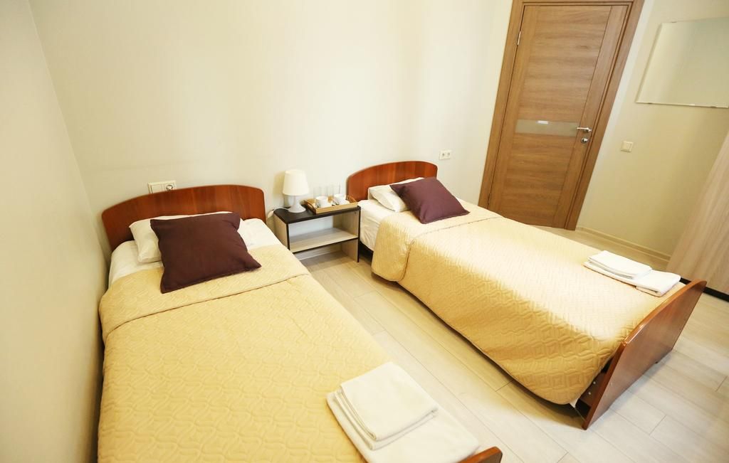 Двухместный номер с 2 отдельными кроватями эконом