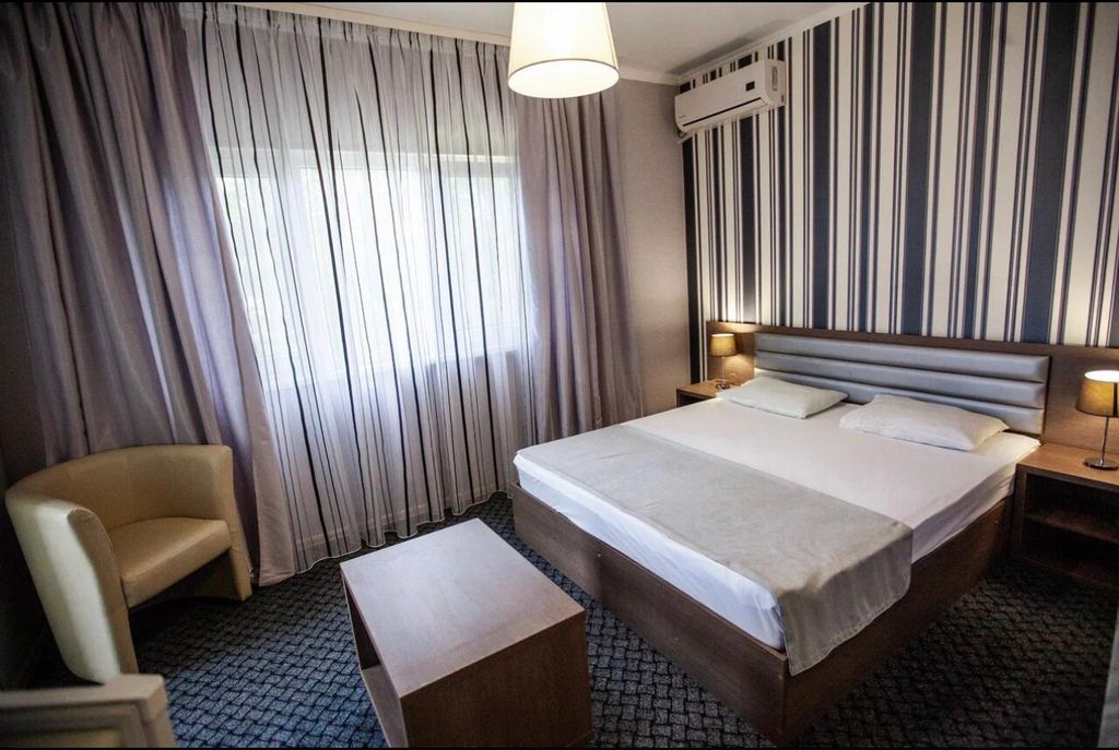 Двухместный номер с 1 кроватью стандарт с угловым балконом