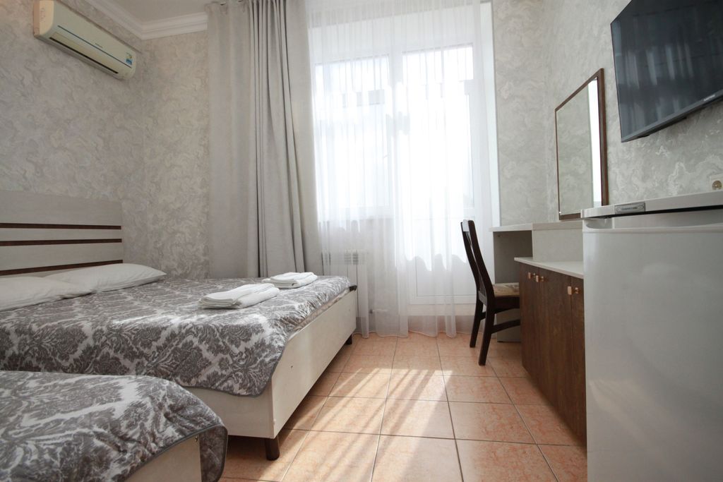 Трёхместный номер полулюкс