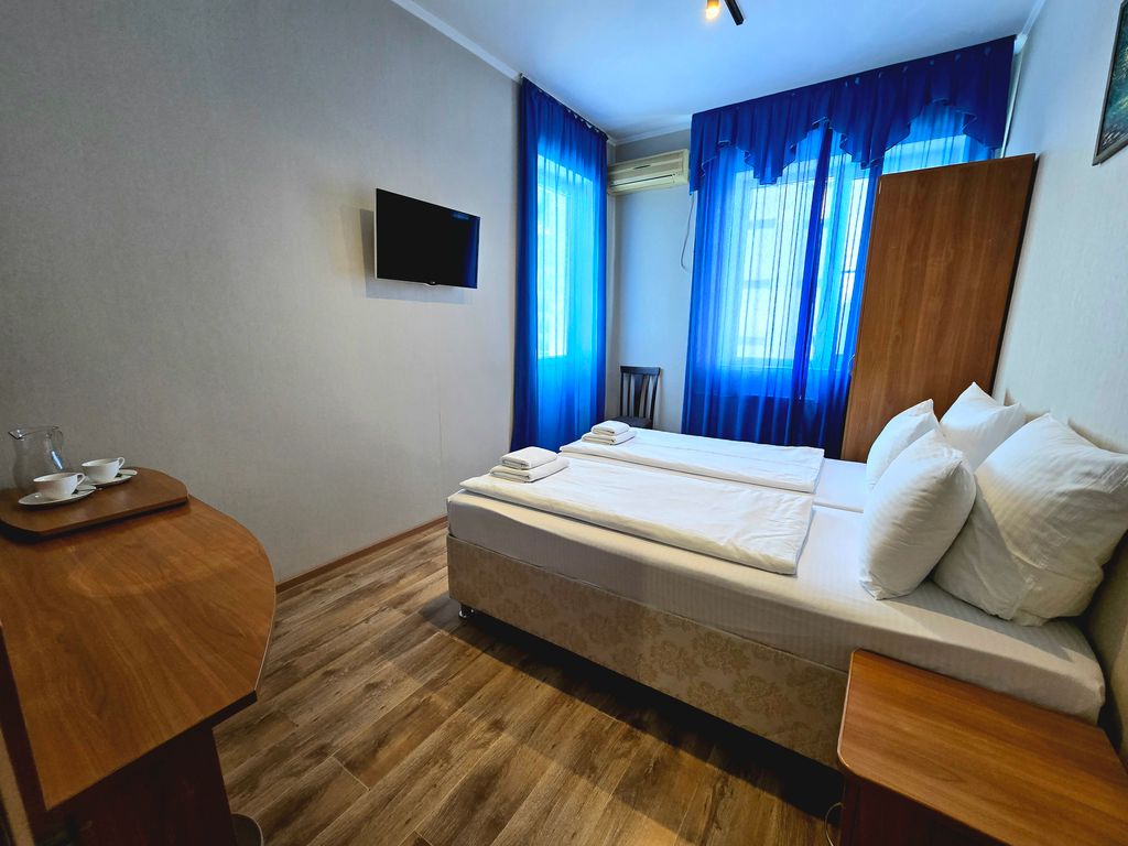 Двухместный номер с 2 отдельными кроватями стандарт