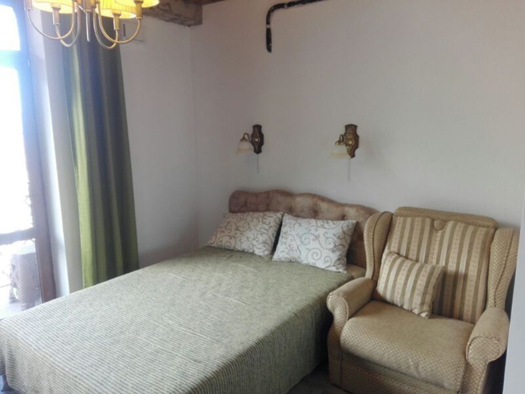 Трёхместный номер студия с кухней и стиральной машинкой