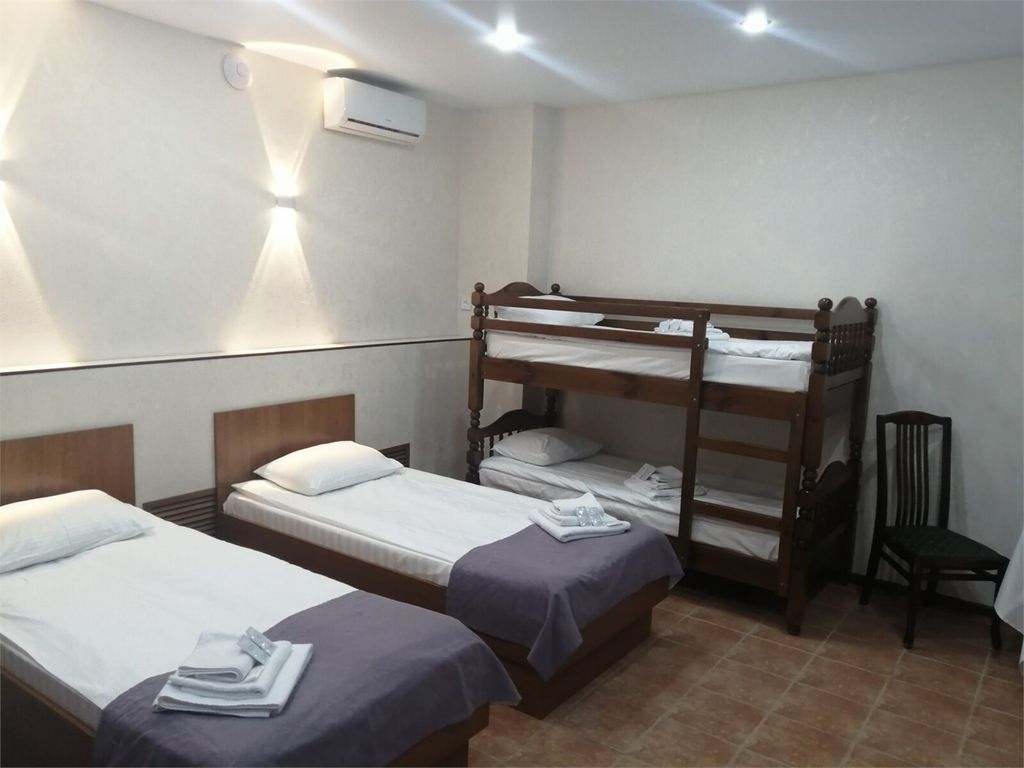 Четырёхместный номер делюкс с сауной и бассейном