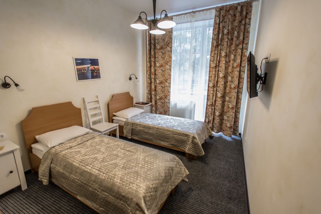 Двухместный номер с 2 отдельными кроватями улучшенный