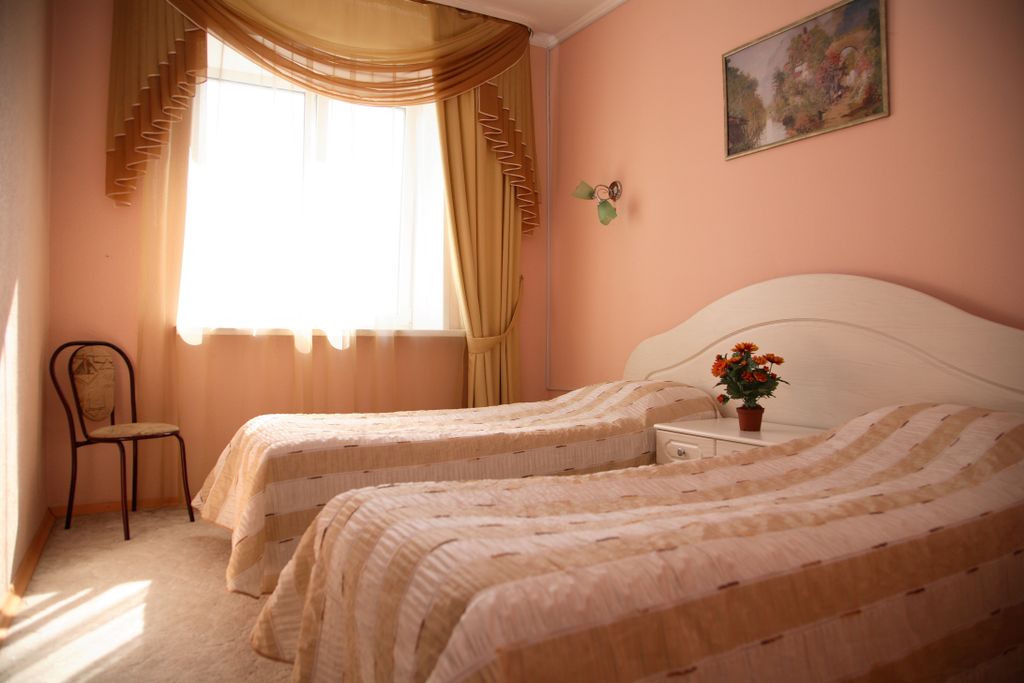 Двухместный номер с 2 отдельными кроватями улучшенный