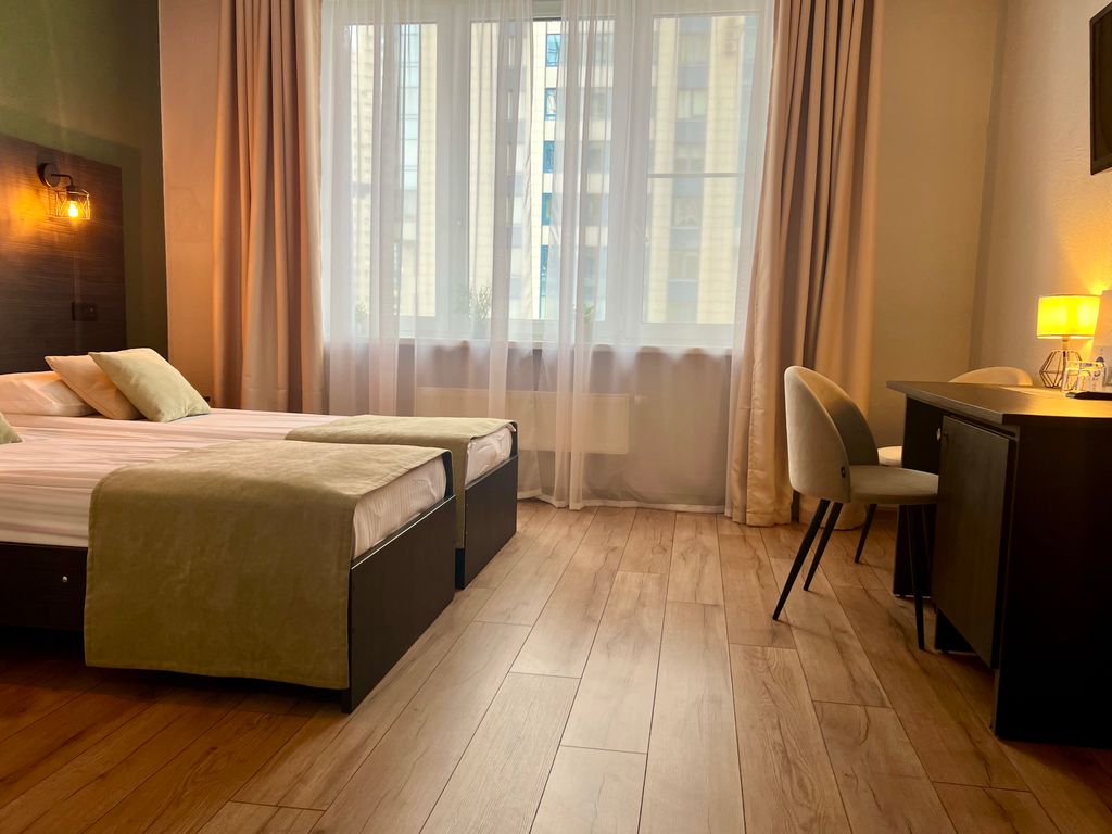 Двухместный номер с 2 отдельными кроватями улучшенный