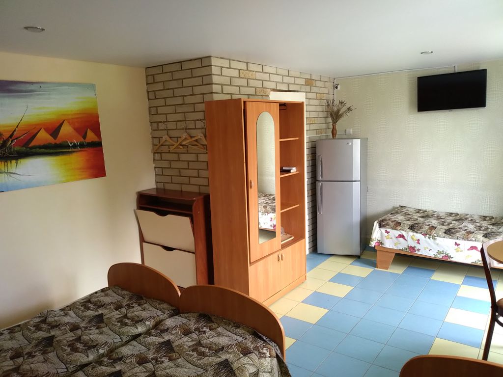 Четырёхместный номер с кондиционером и террасой