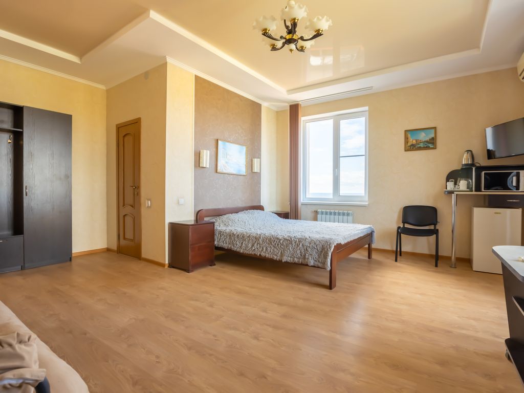 Четырёхместный номер стандарт с балконом