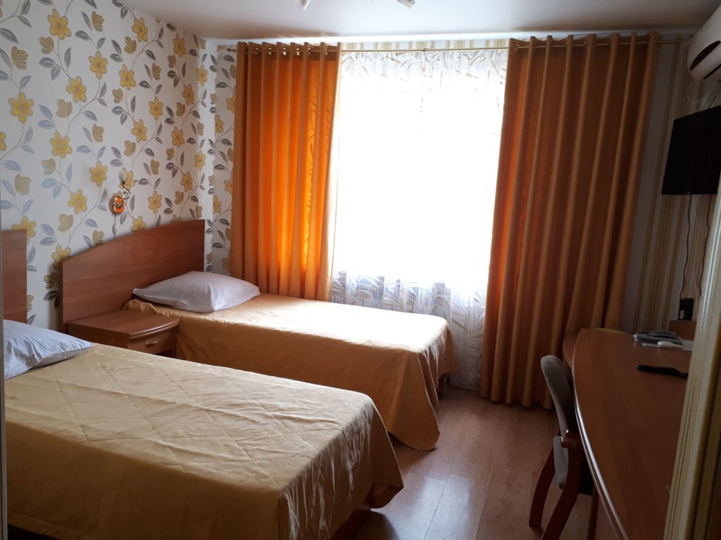 Двухместный номер с 2 отдельными кроватями стандарт