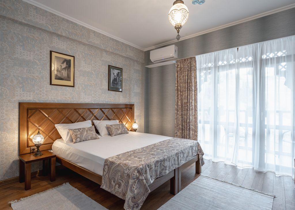 Трёхместный номер делюкс с боковым видом на море и окрестности