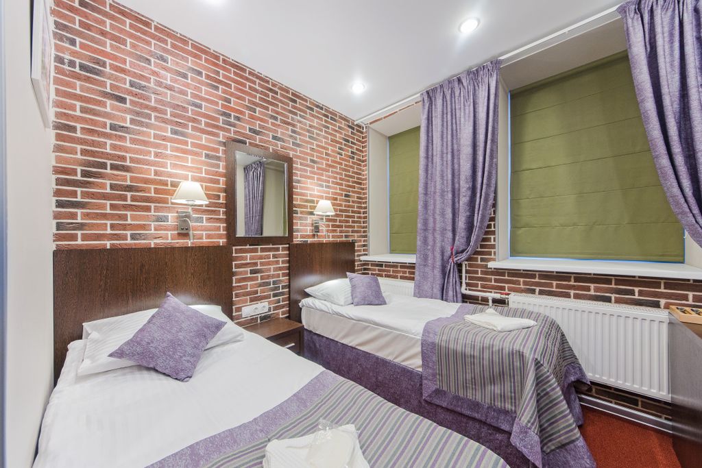 Двухместный с 2 отдельными кроватями студия двухместная с одной совместной или раздельными кроватями