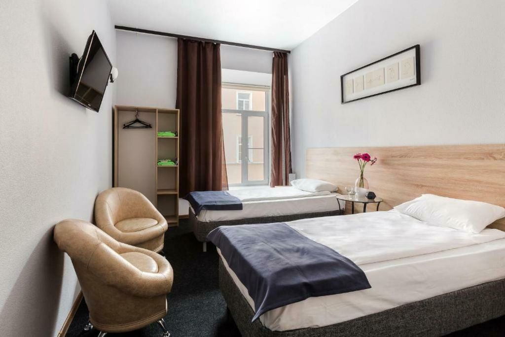 Двухместный номер с 2 отдельными кроватями стандартный с 2 кроватями и собственной ванной