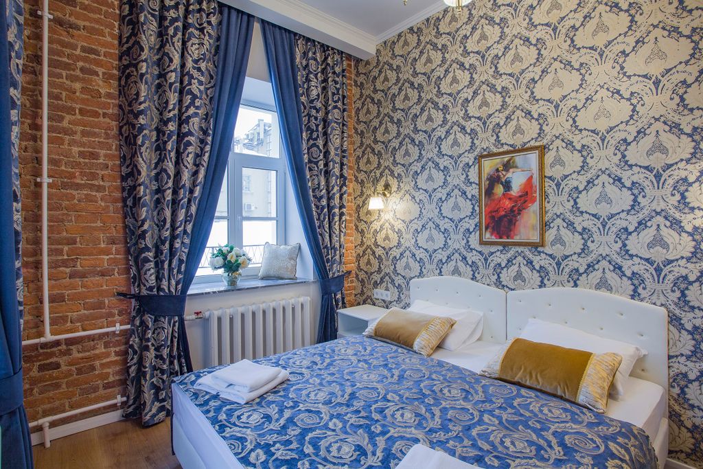 Двухместный номер с 2 отдельными кроватями улучшенный