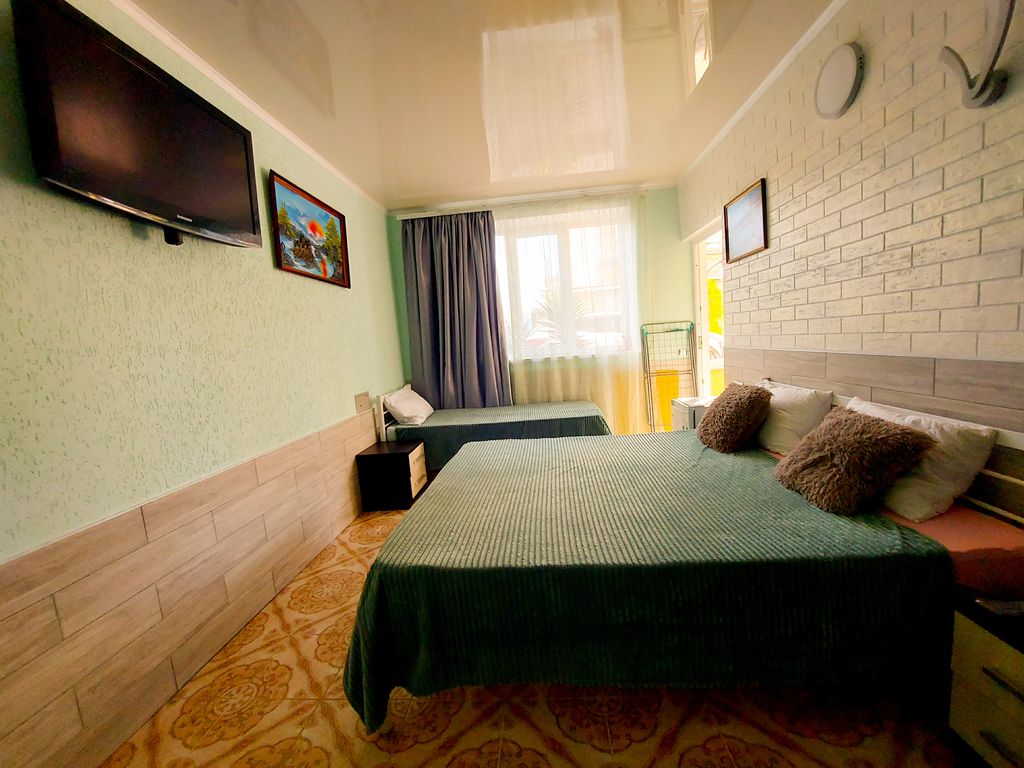 Четырёхместный номер улучшенный с видом на горы