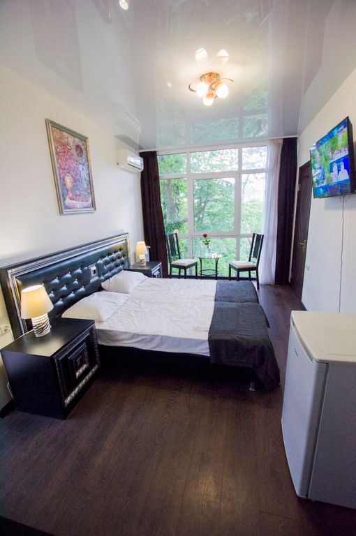 Двухместный номер с 2 отдельными кроватями или 1 двуспальной кроватью с видом на красивый лес