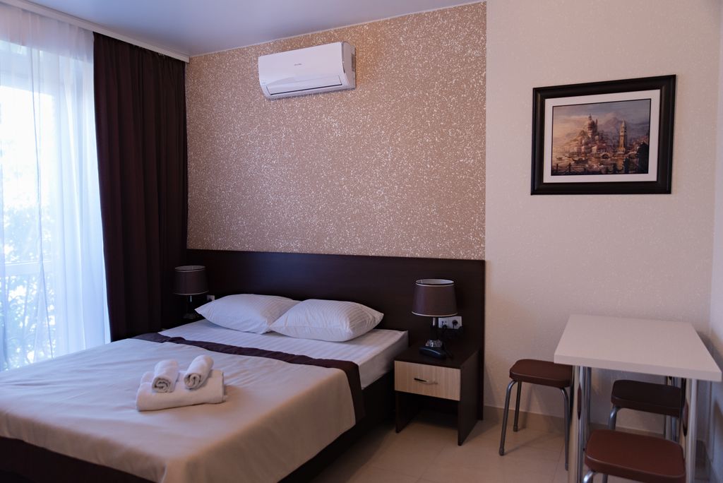 Трёхместный номер делюкс