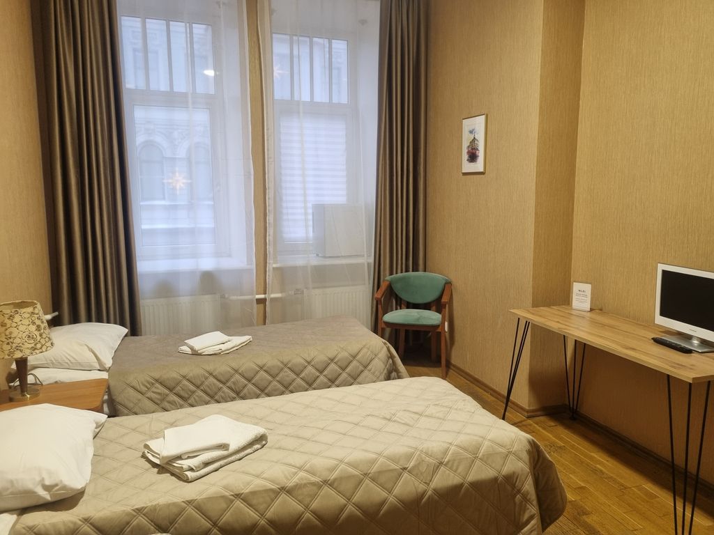 Двухместный с 2 отдельными кроватями с общей ванной комнатой