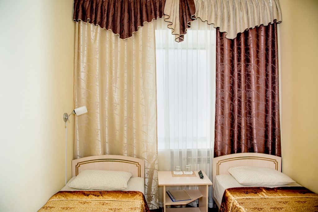 Двухместный номер с 2 отдельными кроватями эконом