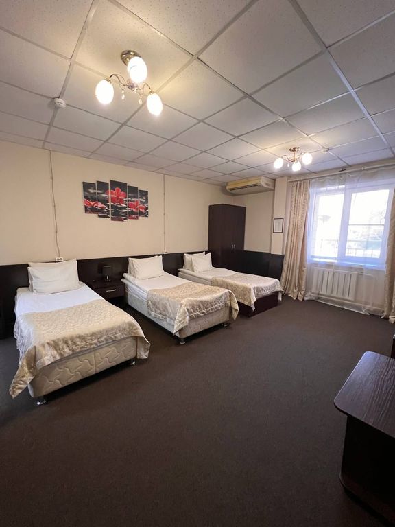 Трёхместный номер люкс с кухней