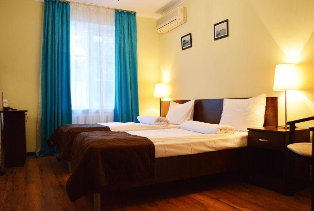 Двухместный номер с 2 отдельными кроватями стандарт без балкона