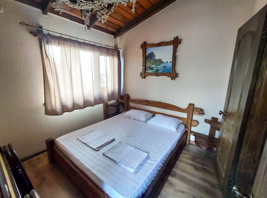 Четырёхместный номер люкс с балконом