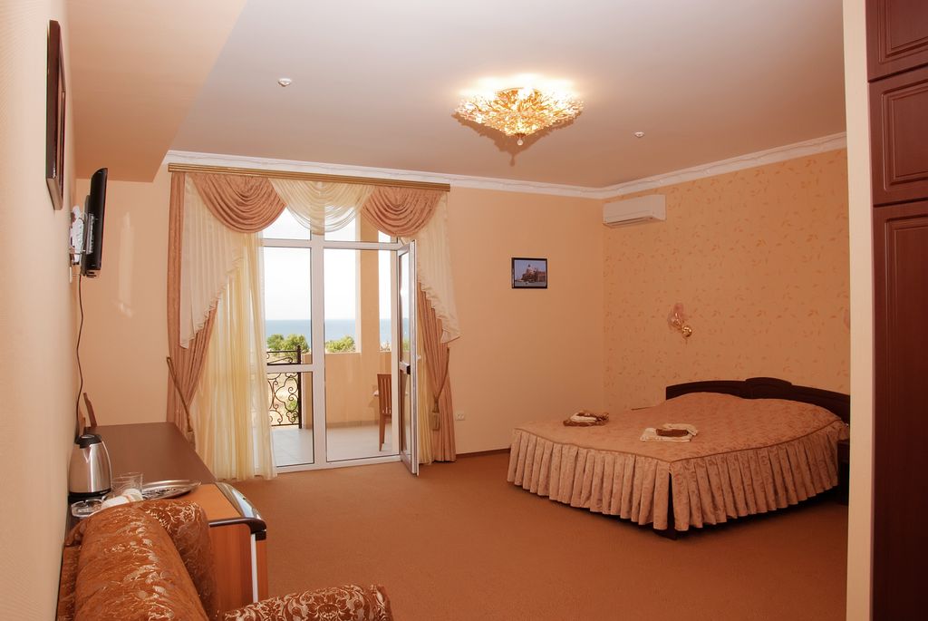 Двухместный номер с 2 отдельными кроватями Стандарт улучшенный