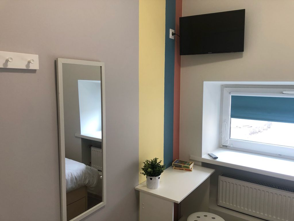 Одноместный номер с кроватью-чердак с общей ванной комнатой