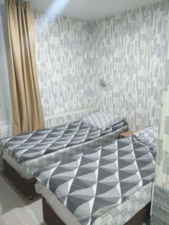 Двухместный номер с 2 отдельными кроватями эконом