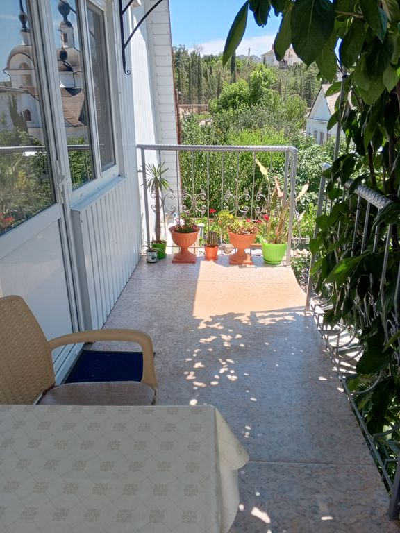 Трёхместный номер люкс с видом на горы