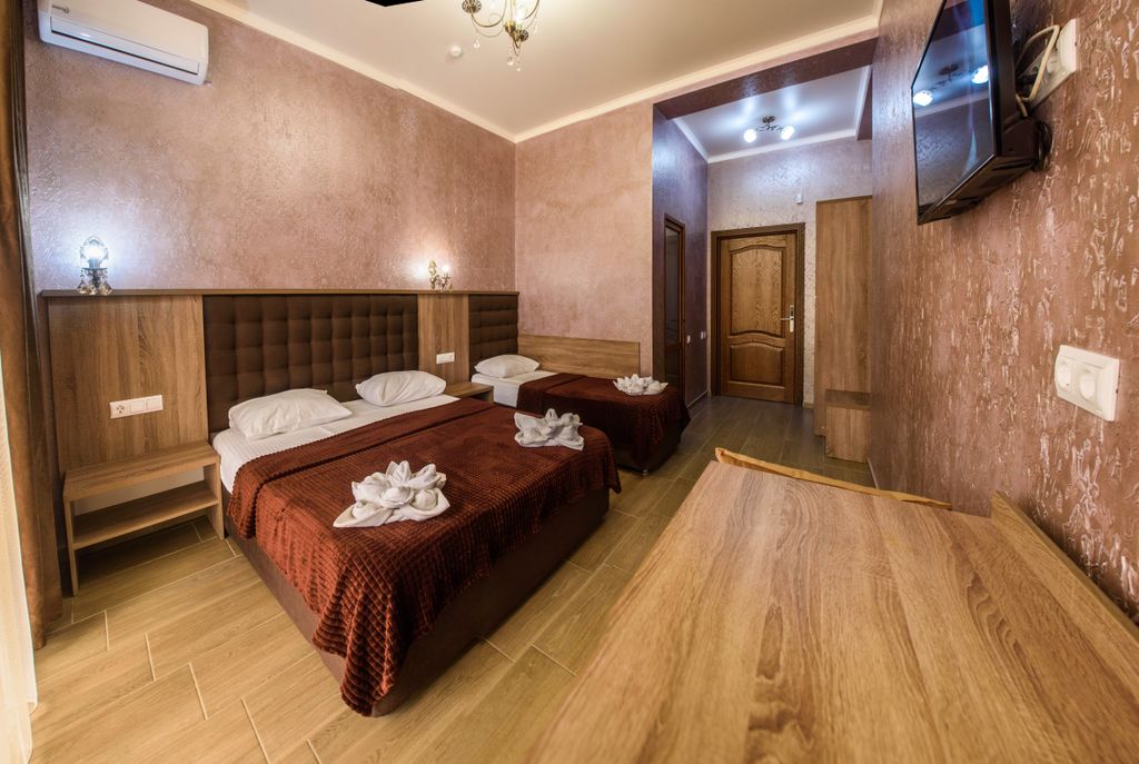 Трёхместный номер 1 этаж с патио