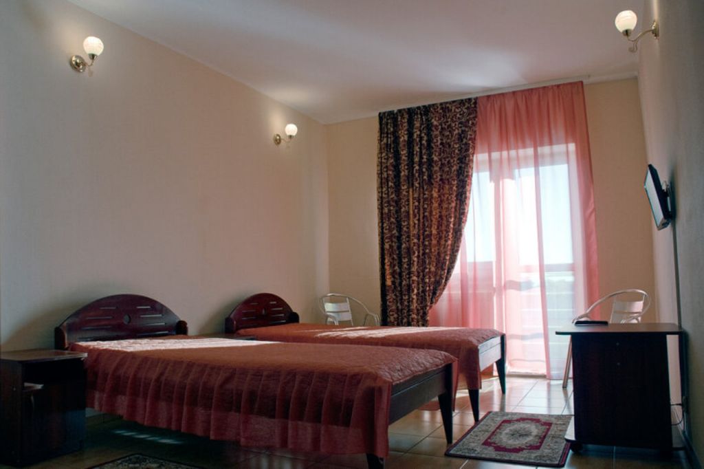 Двухместный номер с 2 отдельными кроватями стандарт