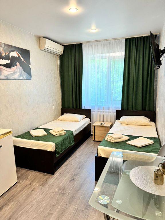 Двухместный номер с 2 отдельными кроватями улучшенный