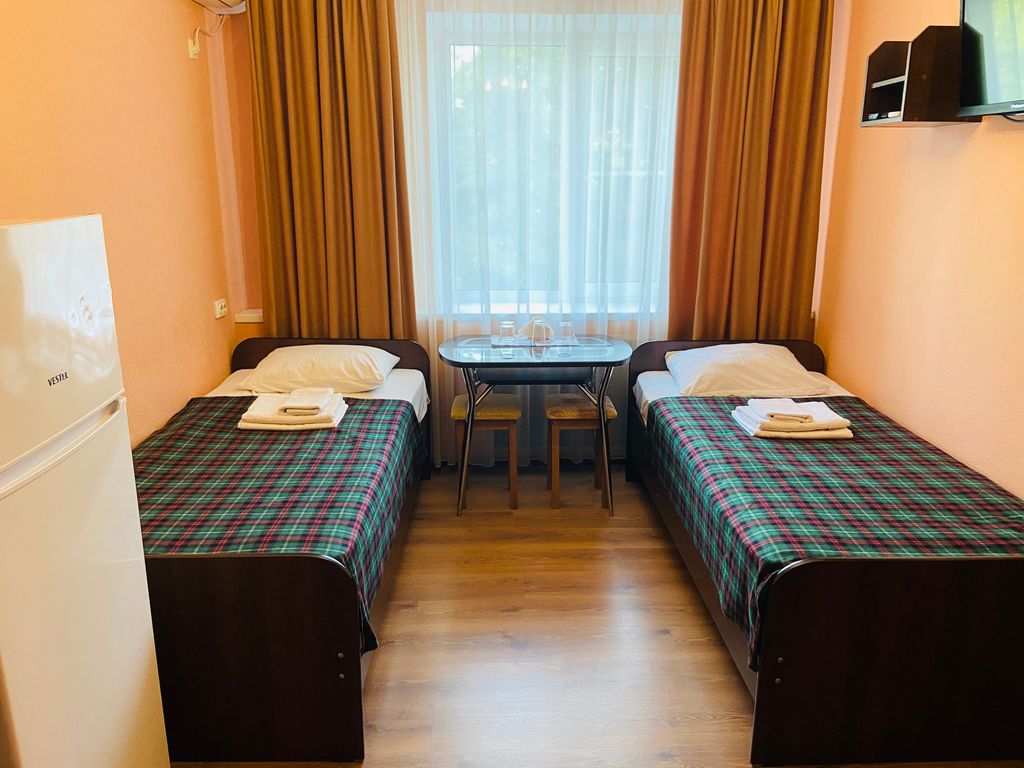 Двухместный номер с 2 отдельными кроватями стандарт