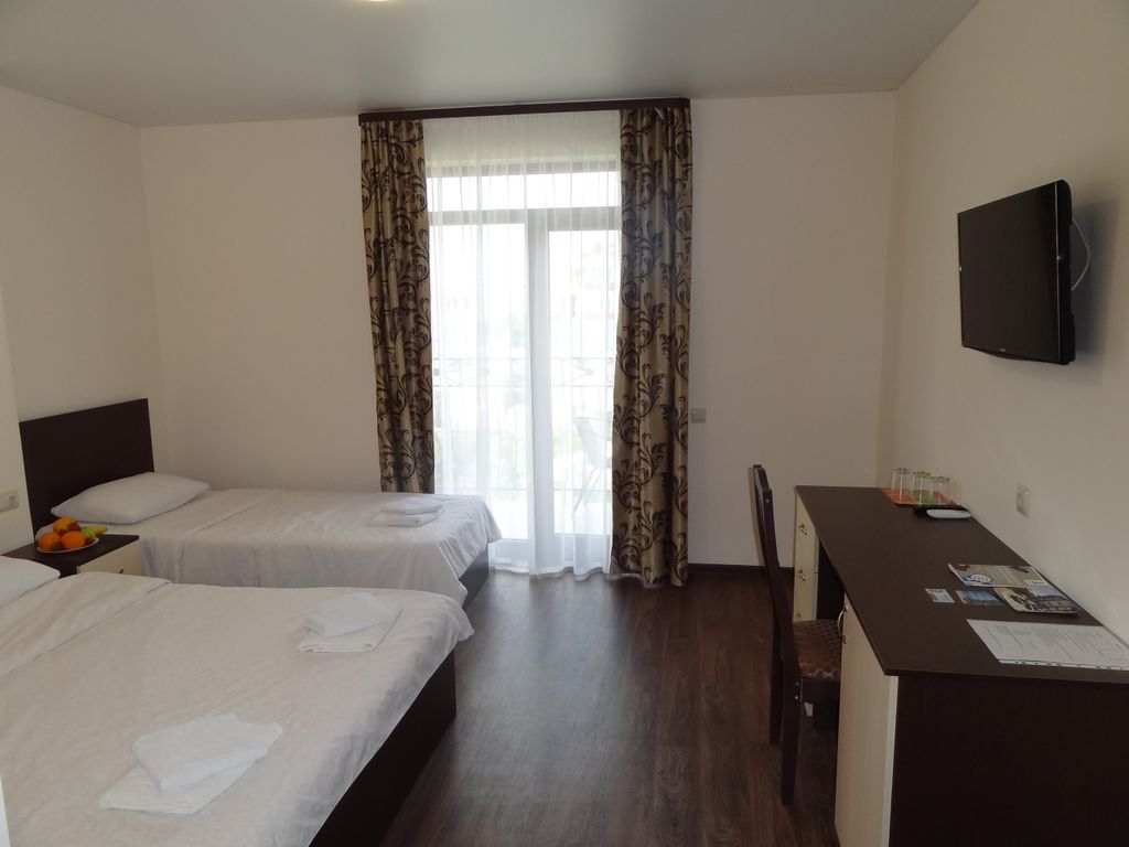 Двухместный номер с 2 отдельными кроватями улучшенный