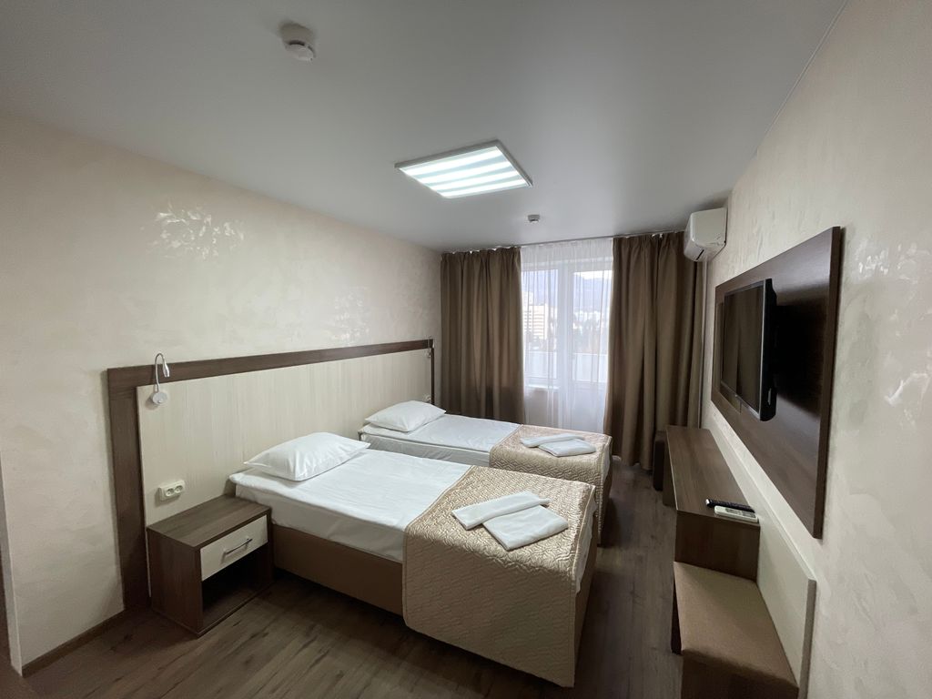 Двухместный номер с 2 отдельными кроватями стандарт