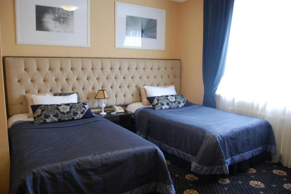 Двухместный номер с 2 отдельными кроватями стандарт