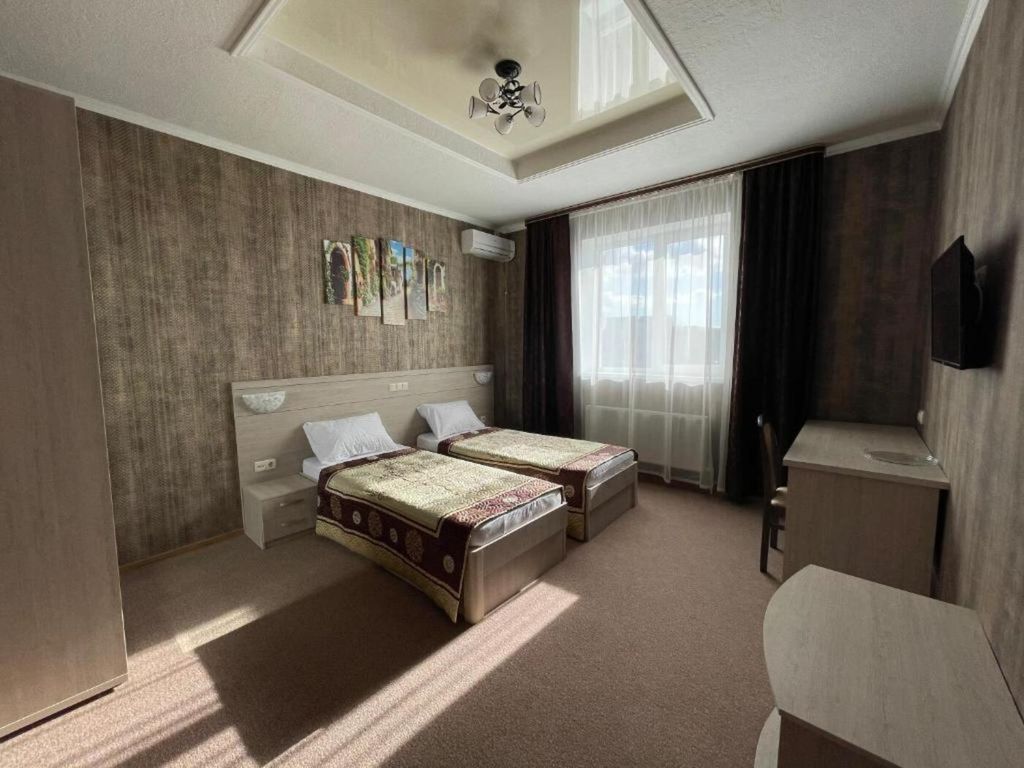 Двухместный номер с 2 отдельными кроватями стандарт