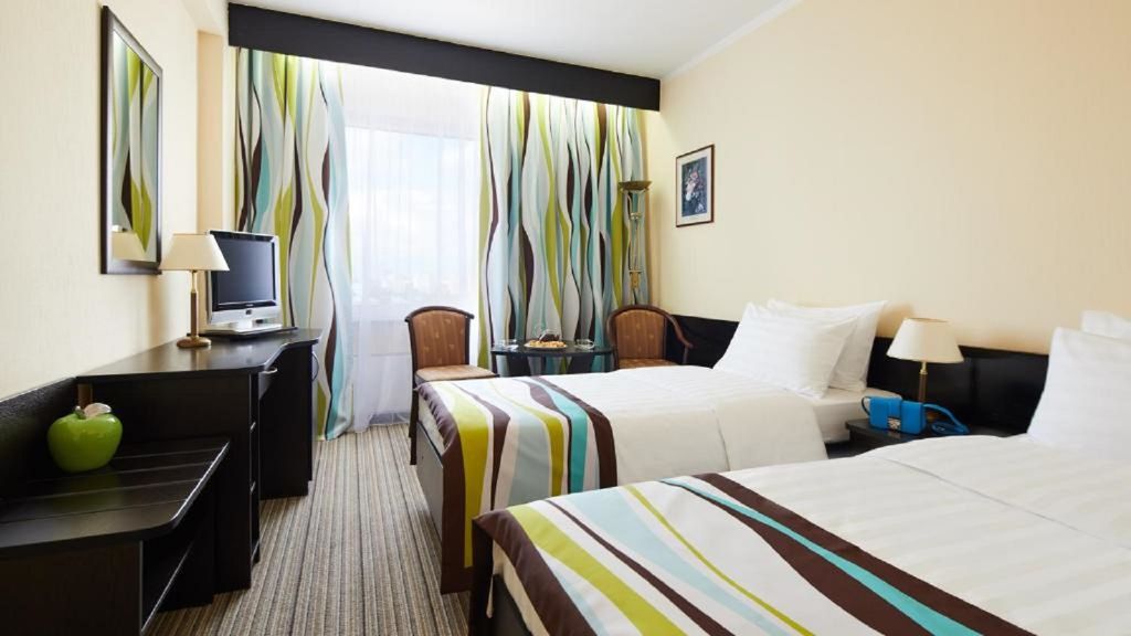 Двухместный номер с 2 отдельными кроватями улучшенный