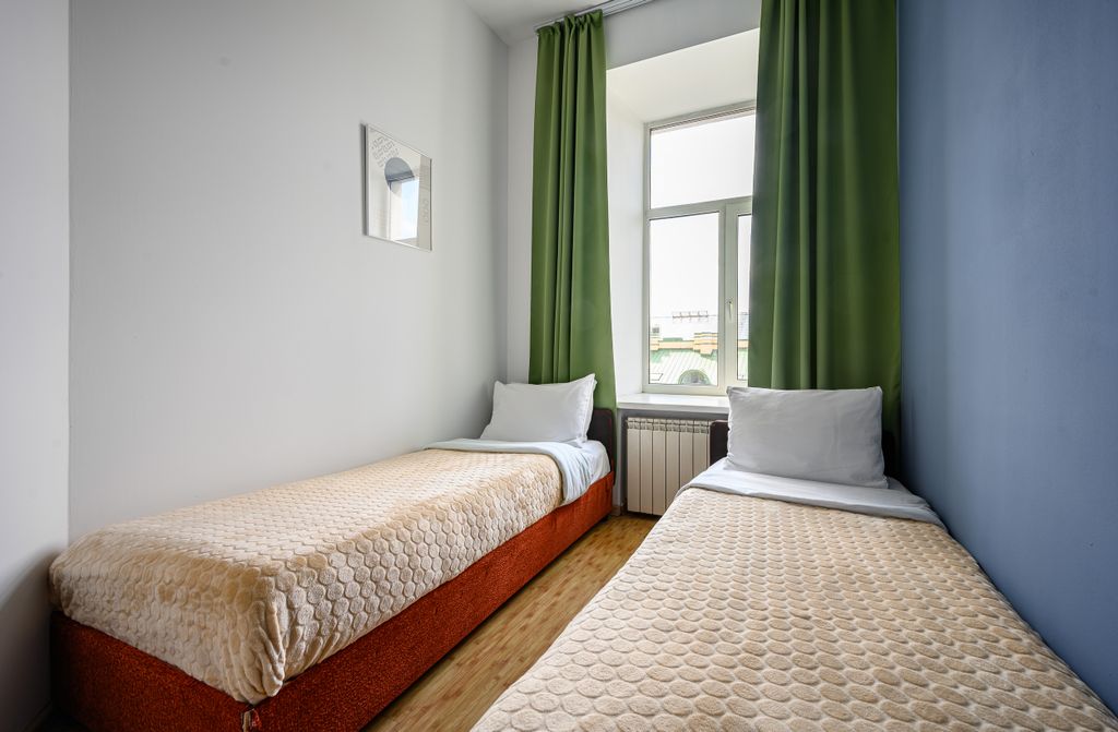 Двухместный номер с 2 отдельными кроватями без удобств (кровати по запросу)