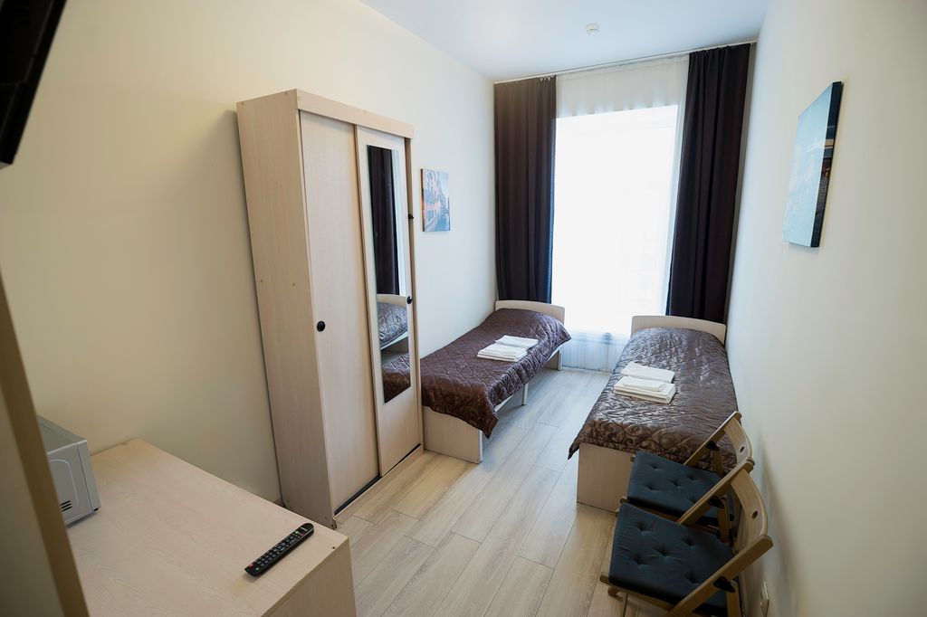 Двухместный номер с 2 отдельными кроватями улучшенный