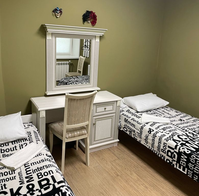 Двухместный номер с 2 отдельными кроватями индивидуальный