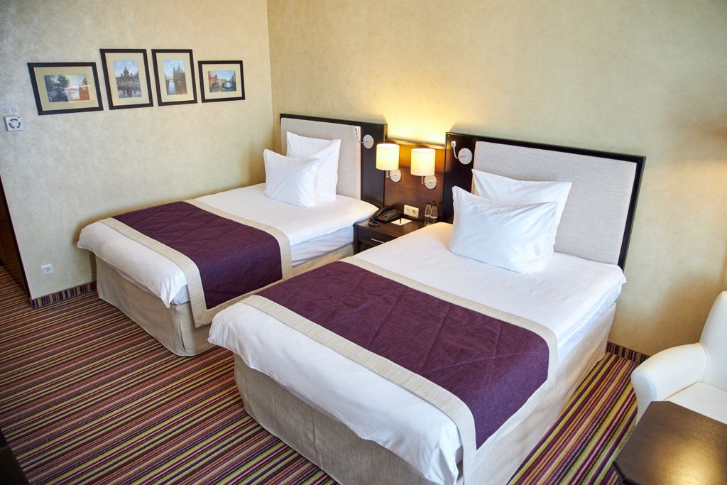 Двухместный номер с 2 отдельными кроватями двухместный номер с двумя кроватями стандарт с балконом | Вид на город