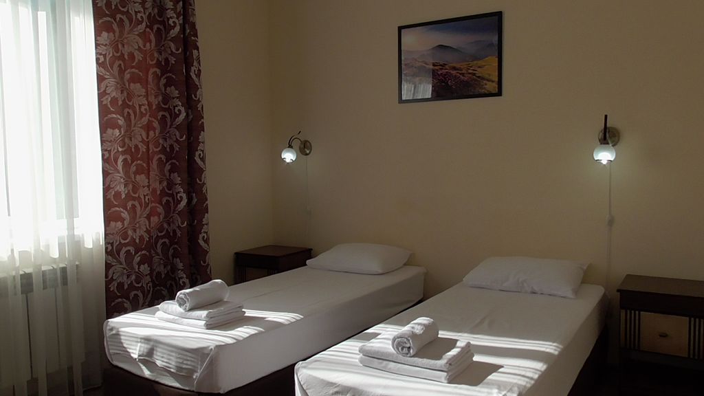 Двухместный номер с 2 отдельными кроватями улучшенный