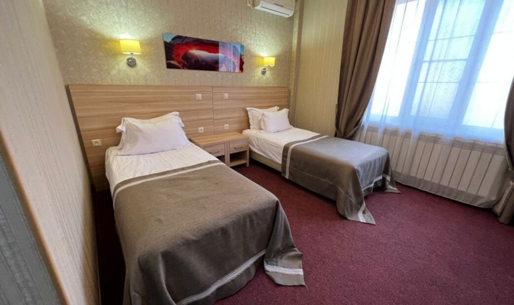 Двухместный номер с 2 отдельными кроватями стандарт